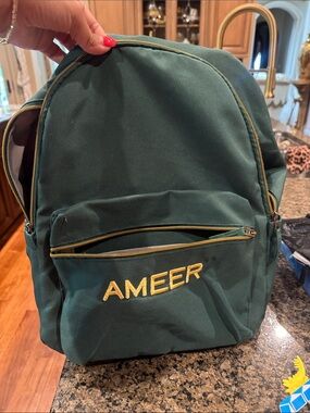 Potter barns backpack with “Ameer” engraved